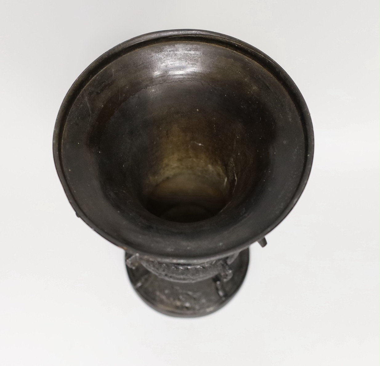 An 18th century Chinese bronze gu vase. 18cm high